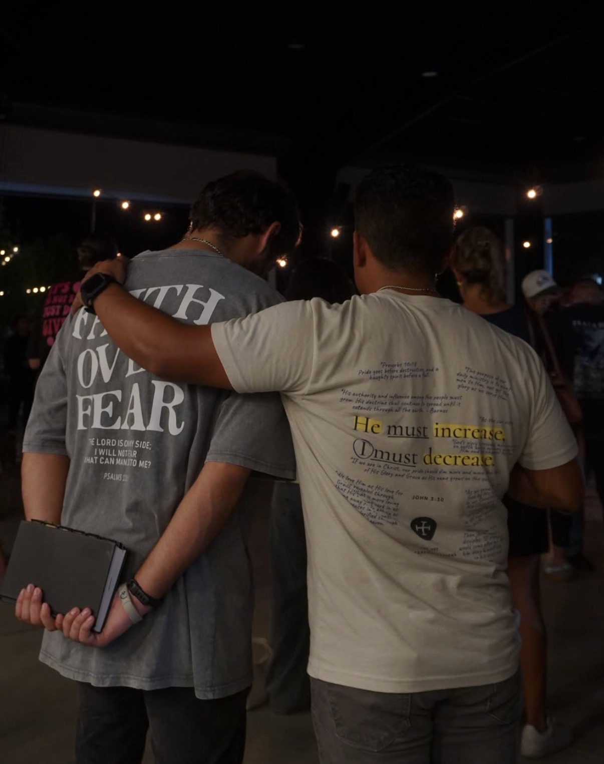 Brothers in faith, arm in arm